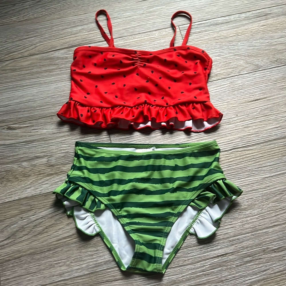 I’m not sure what the brand is but so cute with the ruffles, barely worn